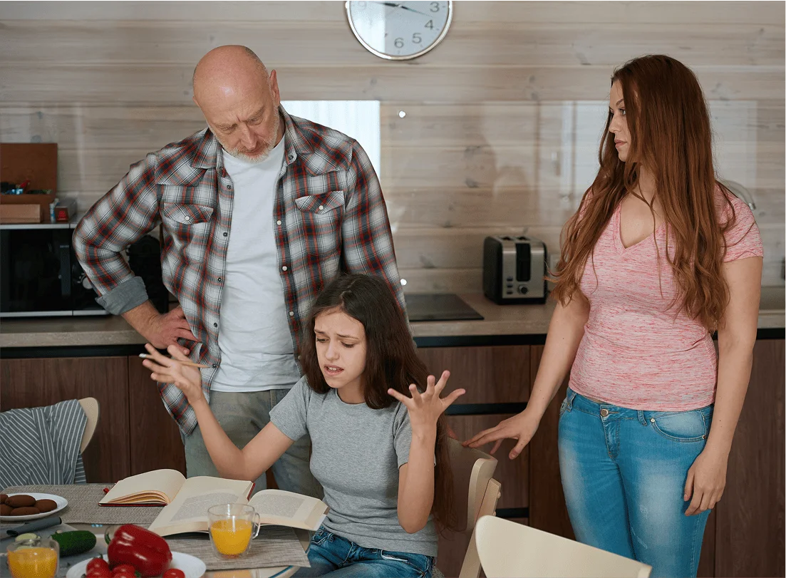 Mom holding baby in arms at home